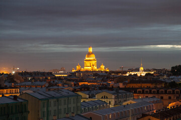Fototapeta na wymiar Saint Petersburg night rooftop cityscape with view on St Isaac's cathedral