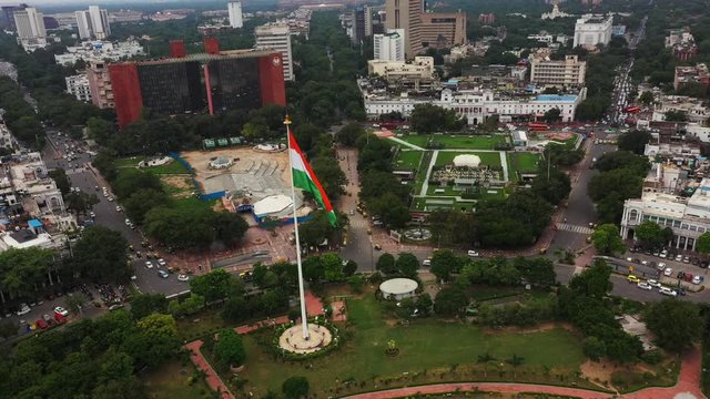 An aerial 360 degree shot of the Indian flag at Connaught Place in New Delhi, India