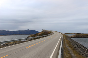 driving on the empty highway in norway mountains