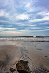 beach view with sea waves at early in the morning from flat angle
