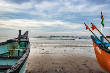 beach view with fishing boats at early in the morning from flat angle