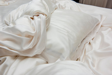 Beautiful bedding on a large bed in the bedroom
