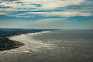 Fototapeta na wymiar beach isolated in aerial shots with dramatic sky