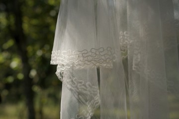 An Antique Bridal Veil In Detail During The Late Summer Afternoon In The Charming Forest 
