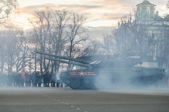 Russian tanks in smoke at the Victory Day parade on Palace Square in St. Petersburg