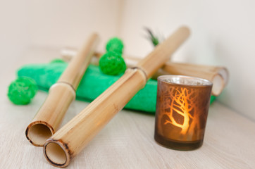 things for massage with bamboo sticks. Spa, wellness concept on bamboo background
