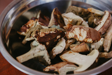 Sliced mushrooms in metal plate. View from above