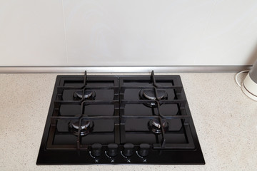 New gas stove in modern kitchen