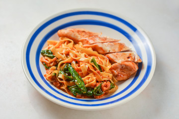 Plate of traditional Italian pasta with meat. Healthy and delicious dinner.