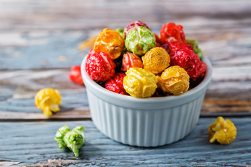Multicolor caramel sweet Popcorn in a white bowl
