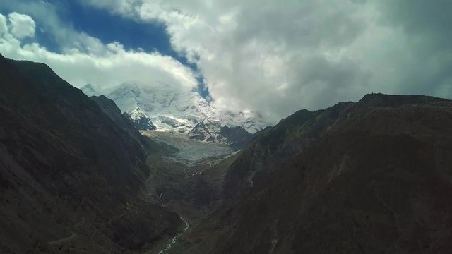 The background of Nanga Parbat Mountain locally known as Diamer, is the ninth highest mountain in the world at 8,126 metres above sea level.