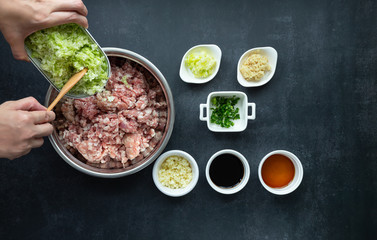 raw pork meat with vegetable and sauce prepared for cooking