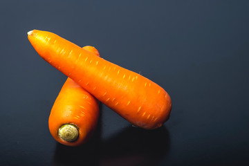 Fresh Carrot on Black Background
