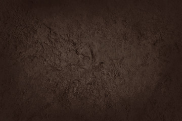 Dark brown slate rock texture with high resolution, background of natural stone wall.