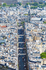 Aerial view of Rue de Rennes and Saint-Germain-des-Pres Abbey in Paris, France. Day shot from Tour Montparnasse observation desk.