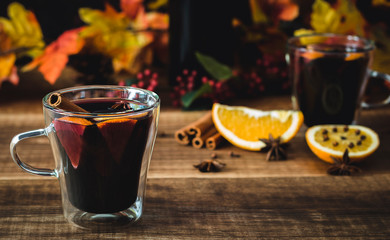 Selective focus of glass with hot mulled wine.