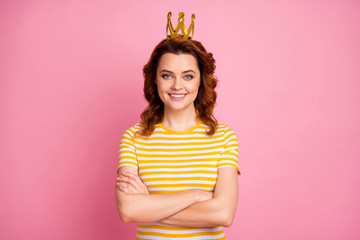 Close-up portrait of her she nice-looking attractive lovely rich wealthy cheerful cheery content wavy-haired girl folded arms wearing crown isolated over pink pastel color background