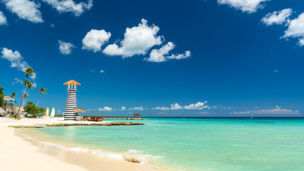 Lighthouse on the beach of the Caribbean, Dominican Republic, Bayahibe - Summer Vacation Concept - obrazy, fototapety, plakaty