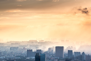 Chengdu backlight skyline aerial view with clouds on the city, Sichuan province, China