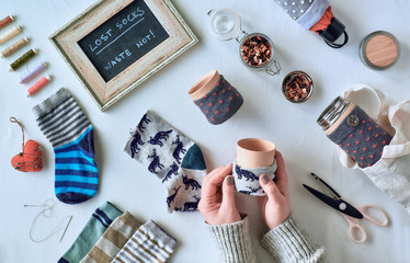 Zero waste household. Making bamboo cups out of stray socks. Upscale of orphaned mismatched socks....