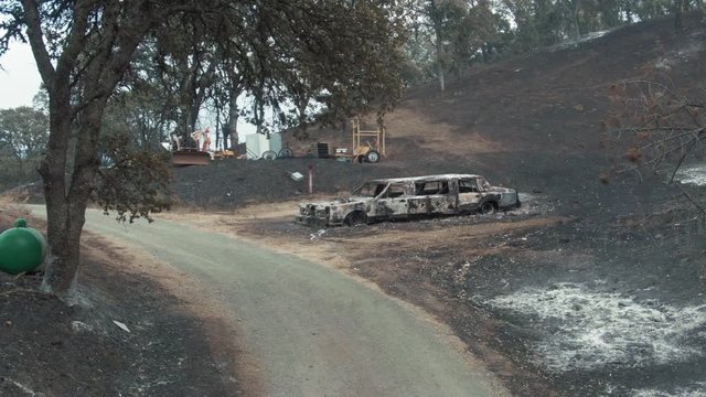 Napa, California, USA. 22 August 2020. Aerial: Burnt out limousine car. LNU Lightning Complex Fire that ravaged the Napa, Sonoma, Lake and Solano counties.