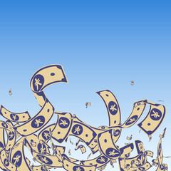 Chinese yuan notes falling. Messy CNY bills on blu