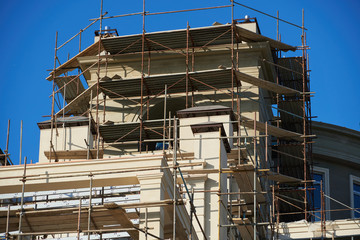 scaffolding and new building as background