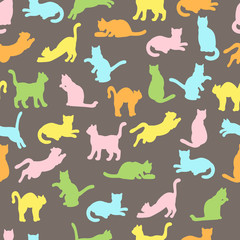 Seamless pattern with multi-colored cat silhouettes