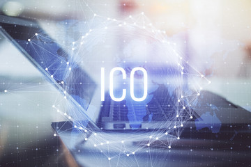 Double exposure of blockchain and crypto economy theme hologram and table with computer background....
