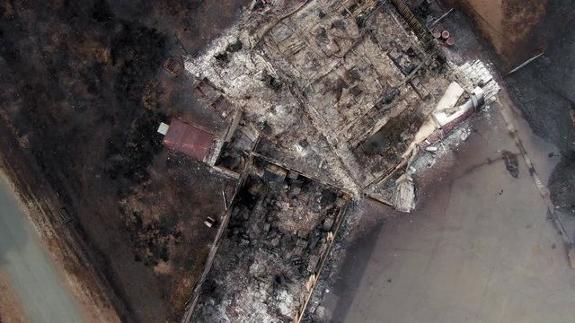 Napa, California, USA. 22 August 2020. Aerial: Burnt down house and car. LNU Lightning Complex Fire that ravaged the Napa, Sonoma, Lake and Solano counties.
