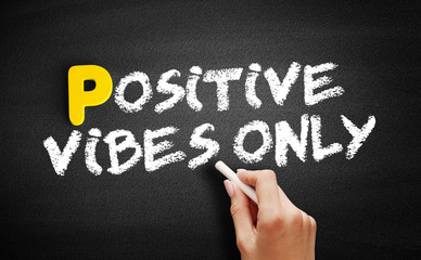Positive Vibes Only text on blackboard