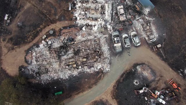 Napa, California, USA. 22 August 2020. Aerial: Burnt out cars and building. LNU Lightning Complex Fire that ravaged the Napa, Sonoma, Lake and Solano counties.