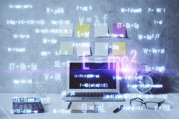 Desktop computer background and formula hologram writing. Double exposure. Education concept.