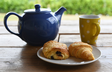 Breakfast out on the terrace with croissants and tea