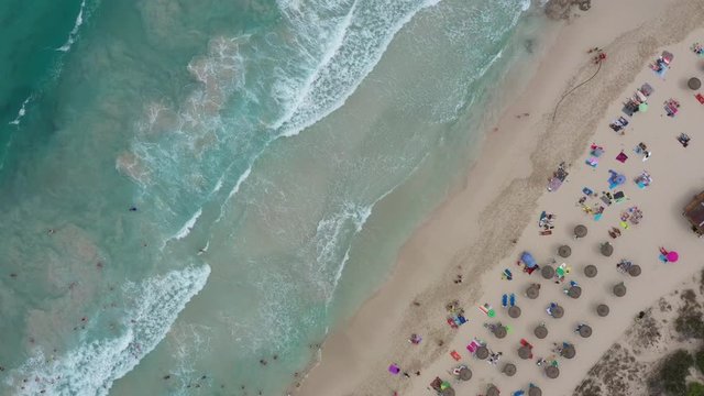Flying a drone over the beach of Cala Agulla in the northeast of the island of Majorca Spain
