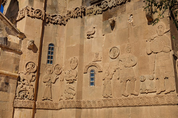 Bas-reliefs on medieval Armenian Cathedral of Holy Cross, Akdamar island, Van Lake, Gevaş Turkey. It's depicting story of David & Goliath from Bible. Writings near persons are their names in Armenian