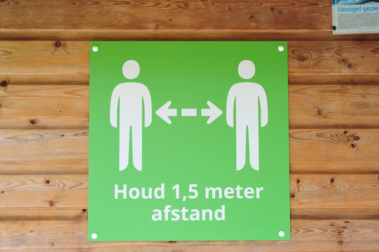 German social distancing sign ''Houd 1,5 meter afstand-keep 1,5 meters away''