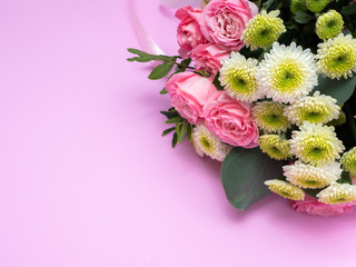 Wedding bouquet on a pink background.