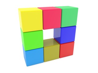 Toy blocks of different colors are stacked on top of each other