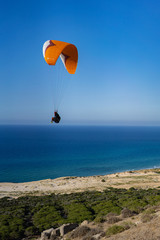 Fototapeta na wymiar paragliding in tunisia- Cap Angela