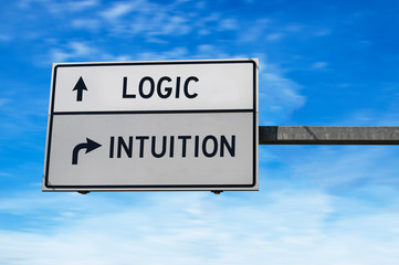 Logic versus intuition. White two street signs with arrow on metal pole. Directional road....
