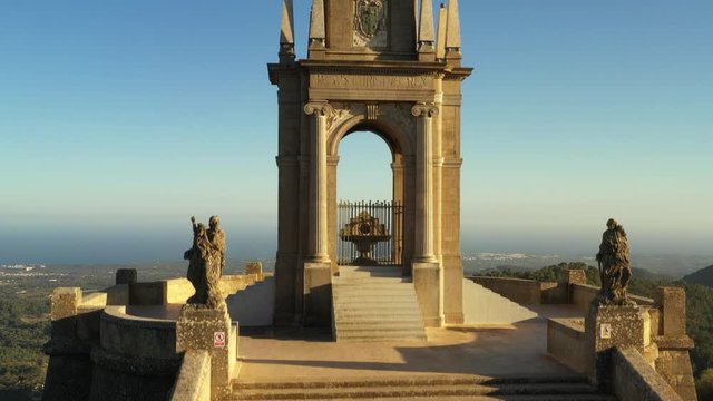 flying a drone over the monastery and statue of Christ sanctuary of San Salvador Majorca Spain
