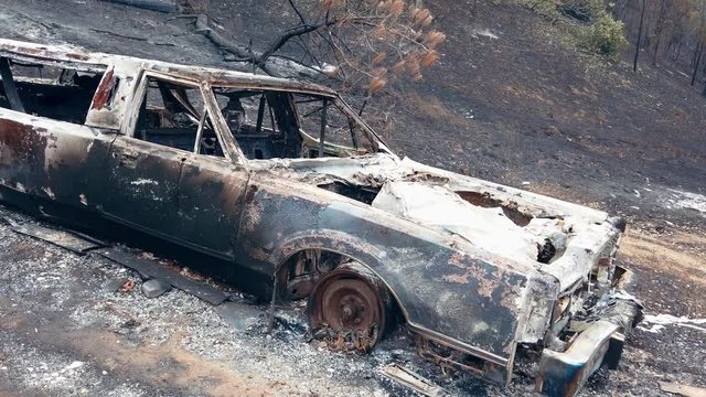 Napa, California, USA. 22 August 2020. Aerial: Burnt out limousine car. LNU Lightning Complex Fire that ravaged the Napa, Sonoma, Lake and Solano counties.