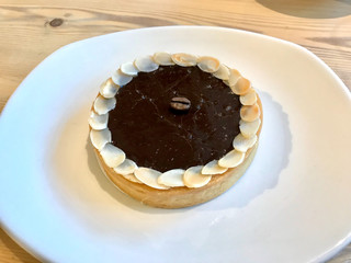 Espresso Tart Portion in Plate at Cafe Shop.