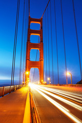 Portrait shot of support of the world famous Golden Gate Bridge at sunrise