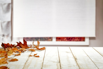 Naklejka na ściany i meble Table background of free space and blurred window 