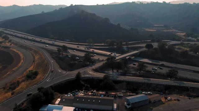 Vacaville, California, USA. 22 August 2020. Freeway traffic and burnt hills on the Interstate 80. LNU Lightning Complex Fire that ravaged the Napa, Sonoma, Lake and Solano counties.