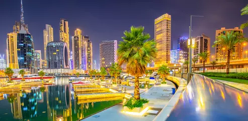 Foto op Canvas Dubai Business Bay district skyline at night, United Arab Emirates © Arcady