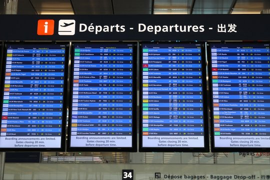 PARIS, FRANCE - NOVEMBER 29, 2019: Departure information display screens at Paris Orly airport in France. It is the 2nd busiest airport in France.