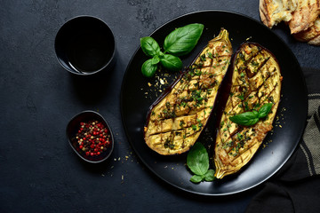 Grilled spicy eggplants. Top view with copy space.